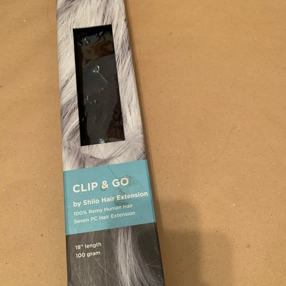 Brand new Clip n go real hair extensions
